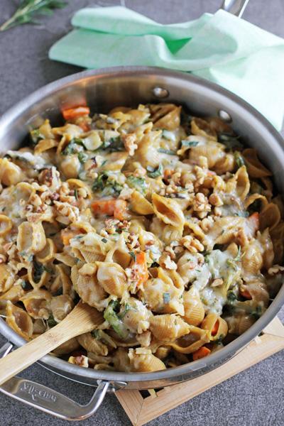 A stainless skillet filled with Butternut Squash Pasta Bake.