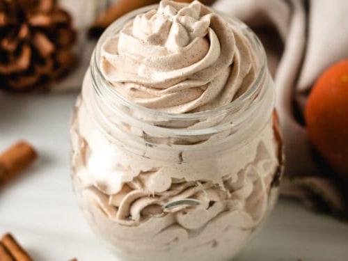 Top down view of spiced whipped cream in a jar.