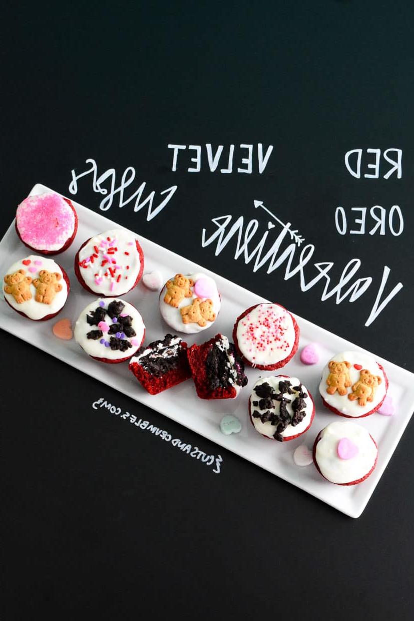 Red Velvet Oreo Valentine Cups on white platter with title written on chalkboard