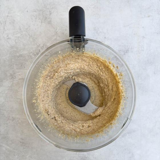 Making the cake batter, ground almonds and lemon in a food processor workbowl.