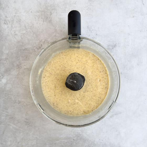 Next steps in making the almond cake batter in a food processor, smooth batter.