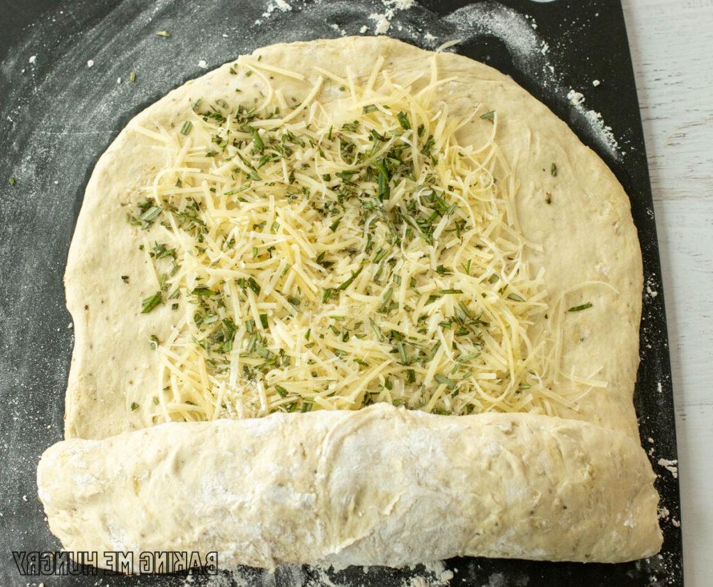 dough being rolled up