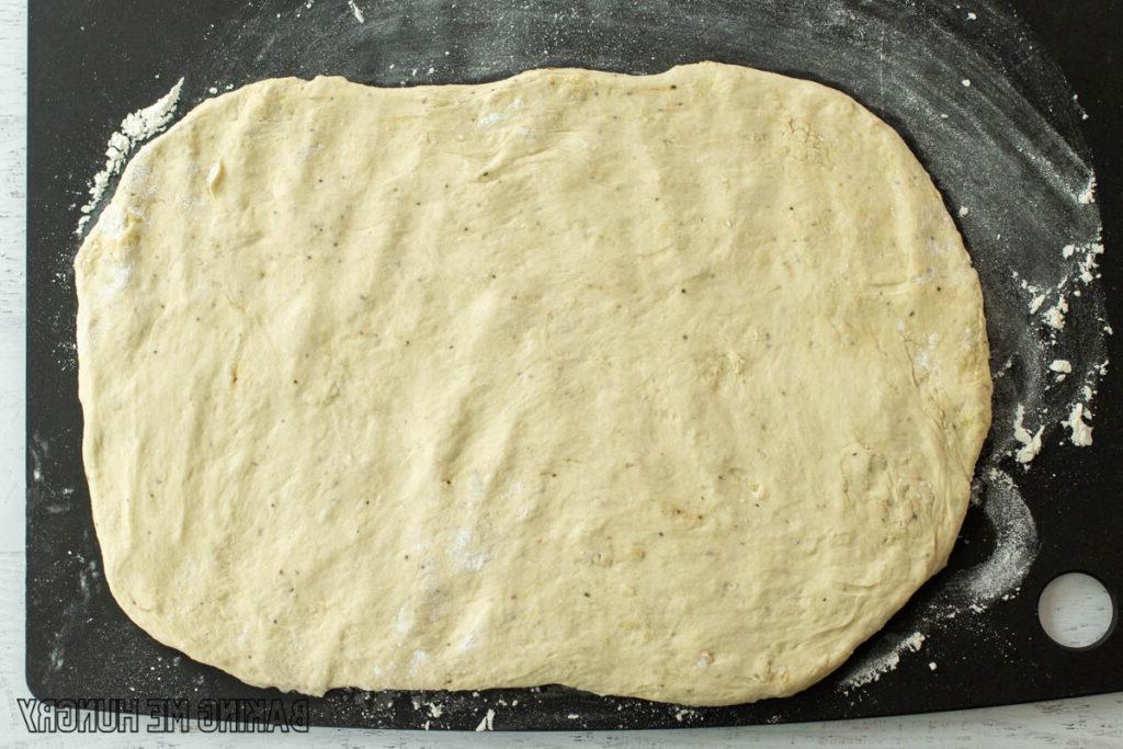 dough pressed into large rectangle