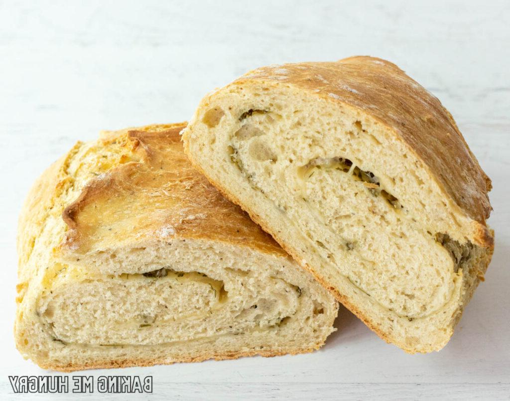 loaf of rosemary parmesan bread cut in half